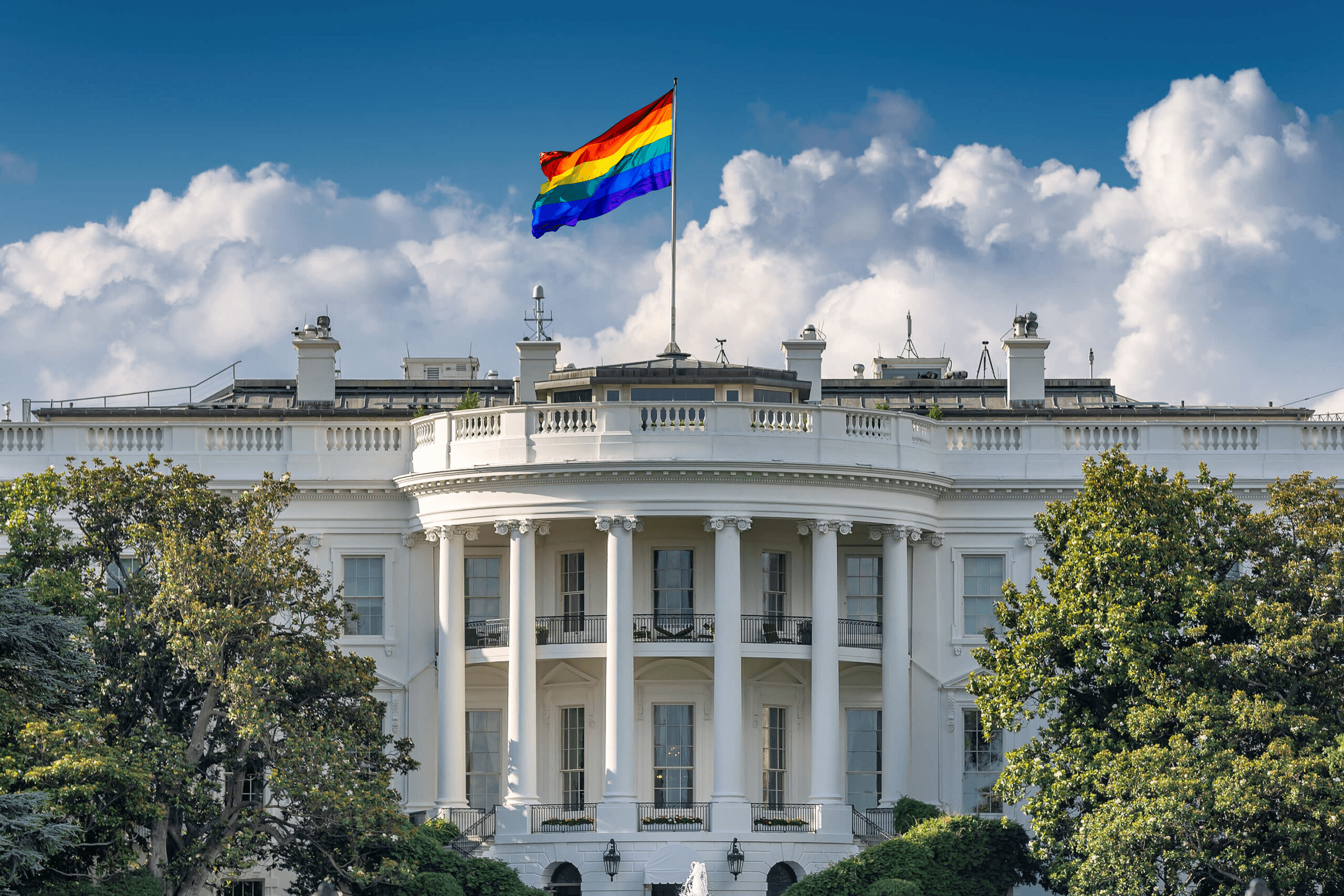 A Pride flag flying over the White House